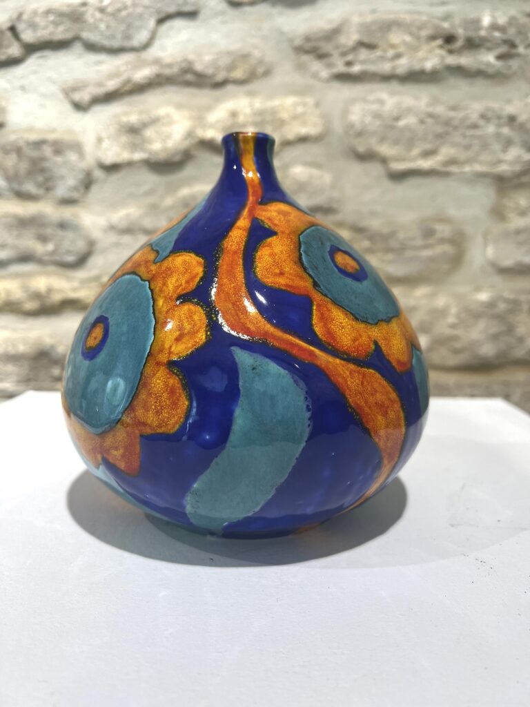 Turquoise orange and blue pot
