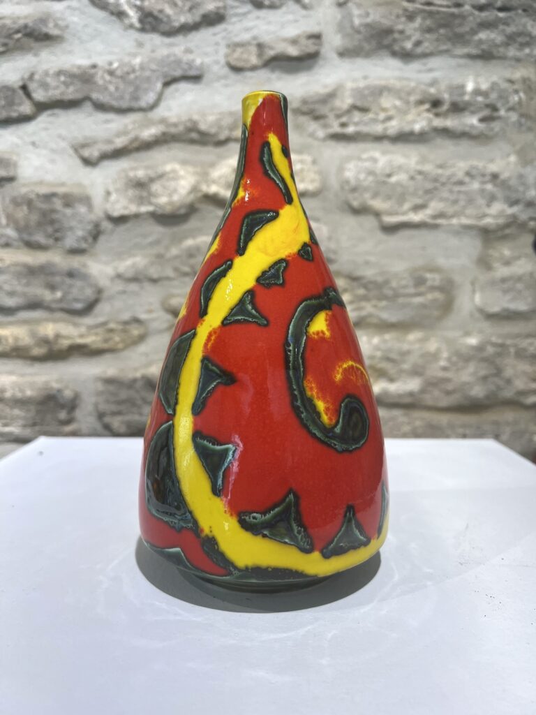 red and yellow bottle kiln pot